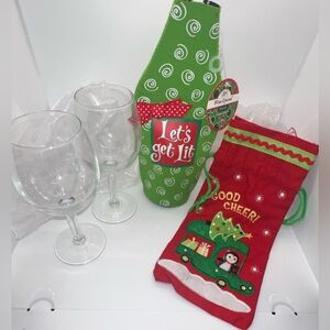 Two Christmas themed wine bottle bags, and two wine glasses